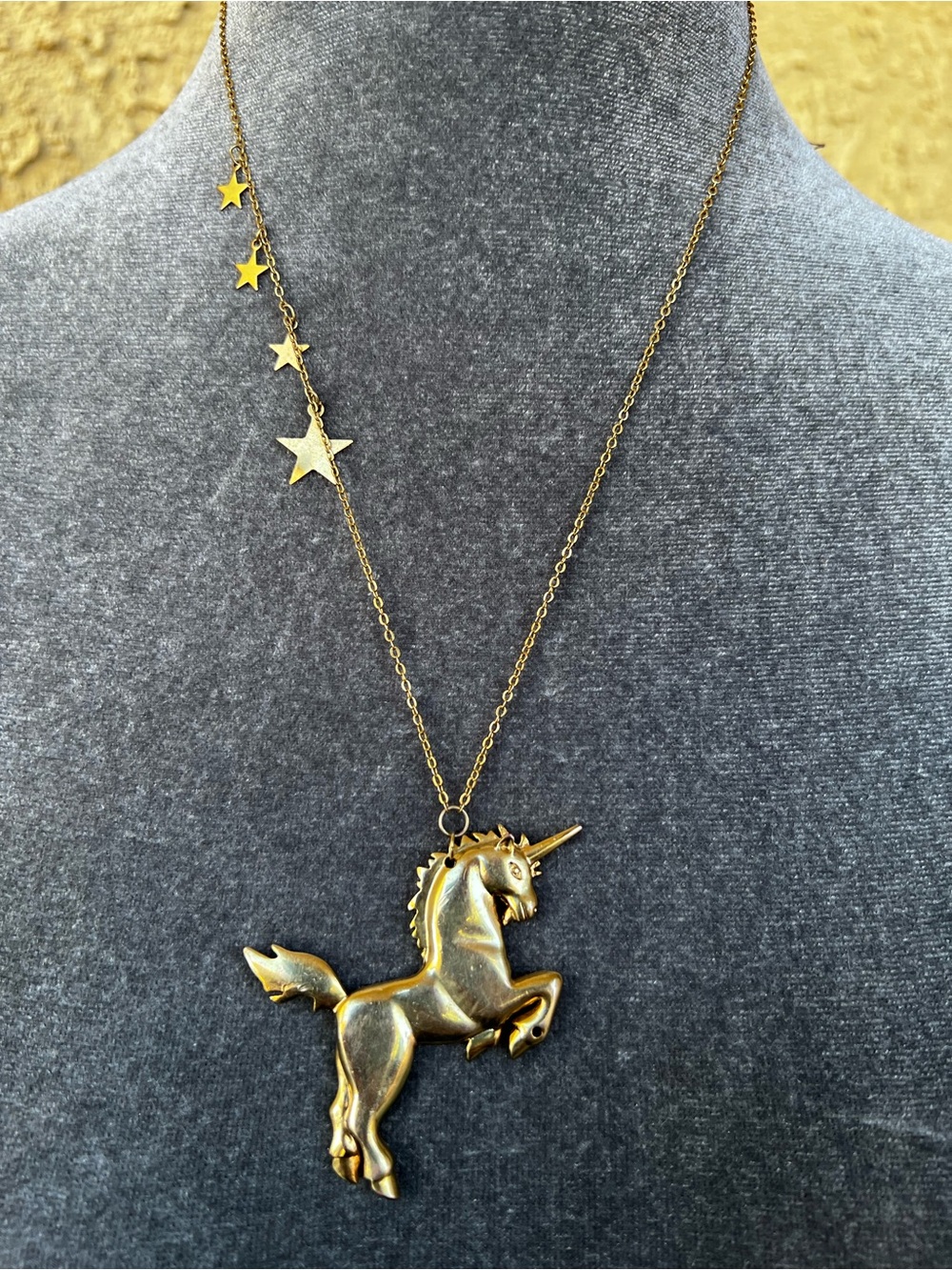 whimsical gold-tone unicorn and star necklace